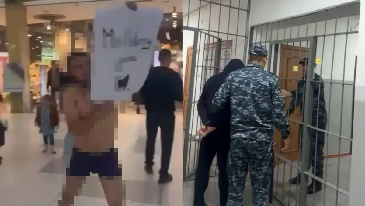 Мужчина в полуобнаженном виде бегал по ТРЦ с плакатом (+ВИДЕО)